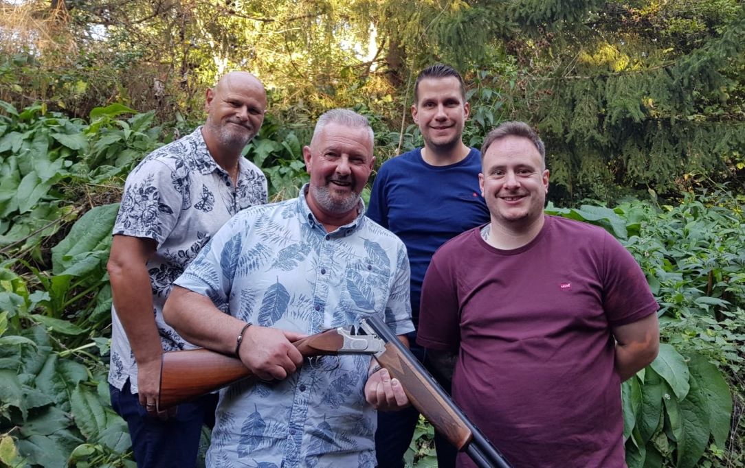Group celebrating a win at a stag party at The March Hare Leisure Centre